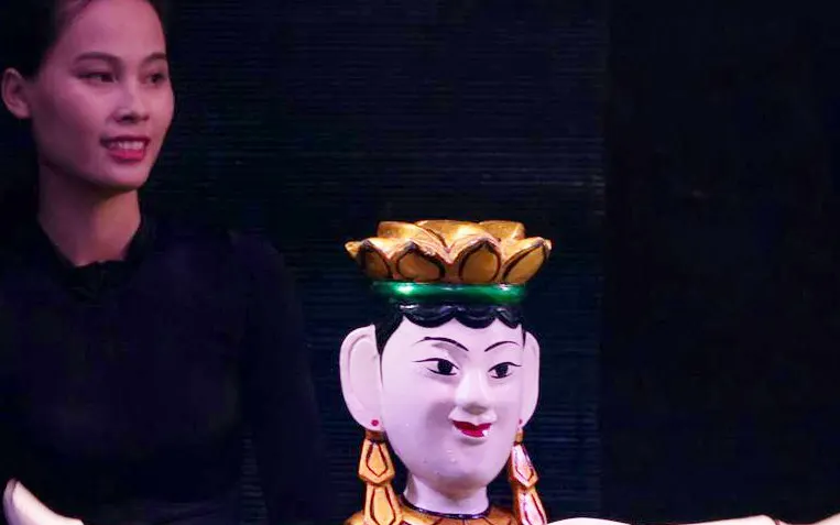 Performers with puppets at Thang Long Water Puppet Show in Hanoi, Vietnam.
