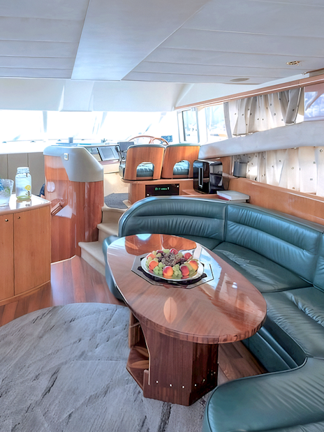Interior of a Whale Watching boat in Skjervøy with seating and refreshments.