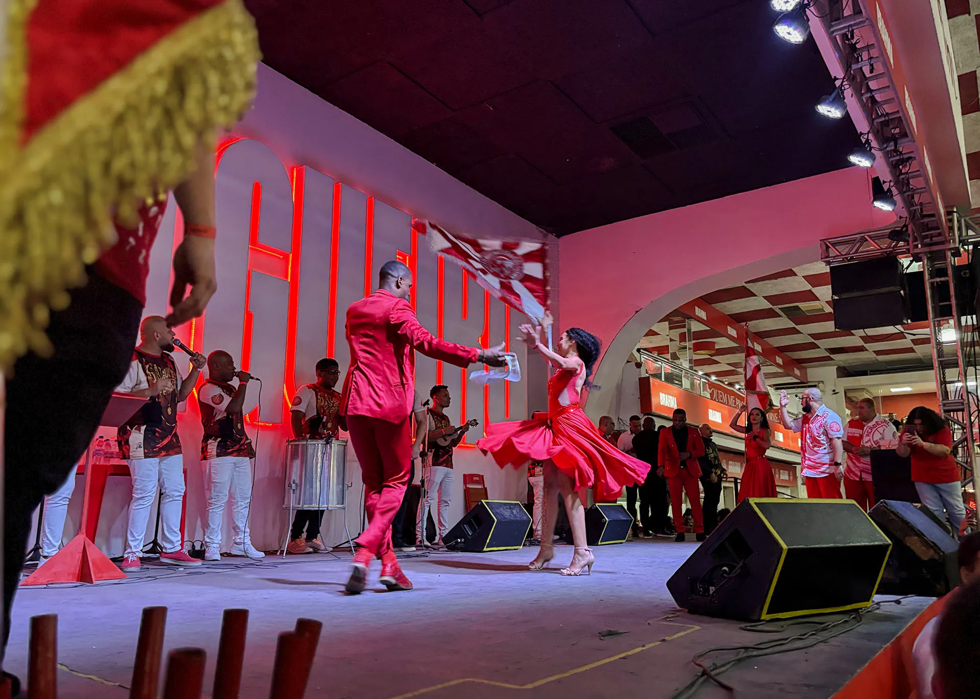 Dancers performing samba at Salgueiro Live event in Rio de Janeiro.
