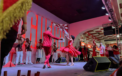 Dancers performing samba at Salgueiro Live event in Rio de Janeiro.