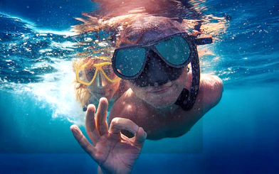 Guests snorkeling in clear waters during Bol, Hvar, Pakleni islands & Šolta tour.