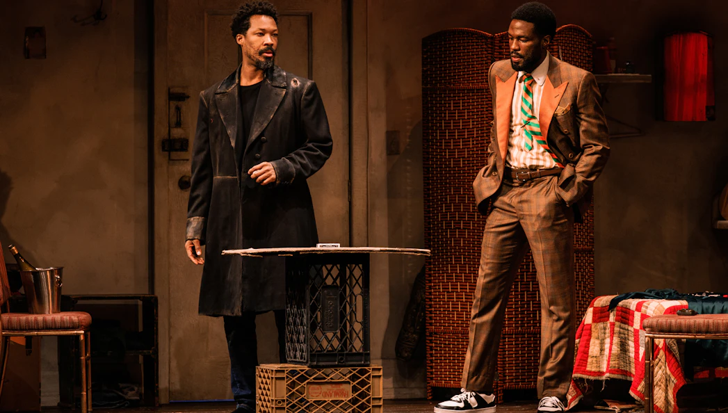 #Two actors on stage in a scene from "Topdog/Underdog" play.