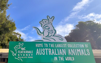 Featherdale Wildlife Park entrance sign with kangaroo illustration, Sydney.