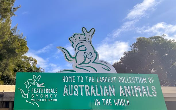 Featherdale Wildlife Park entrance sign with kangaroo illustration, Sydney.