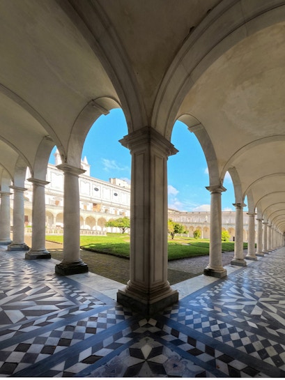 Cloister arches and courtyard at Certosa di San Martino, Naples.