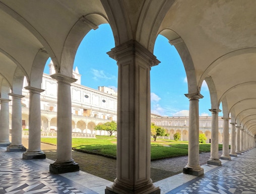 Cloister arches and courtyard at Certosa di San Martino, Naples.