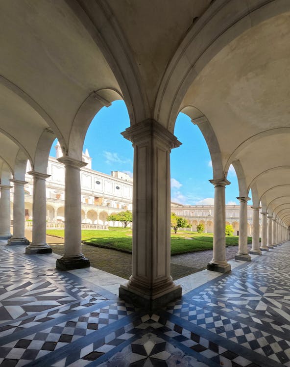 Cloister arches and courtyard at Certosa di San Martino, Naples.