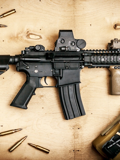 Rifle and gear at extreme shooting range with hotel transfer.