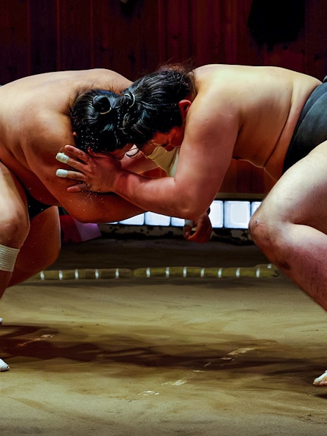 Sumo wrestlers practicing at a Tokyo stable during morning tour.