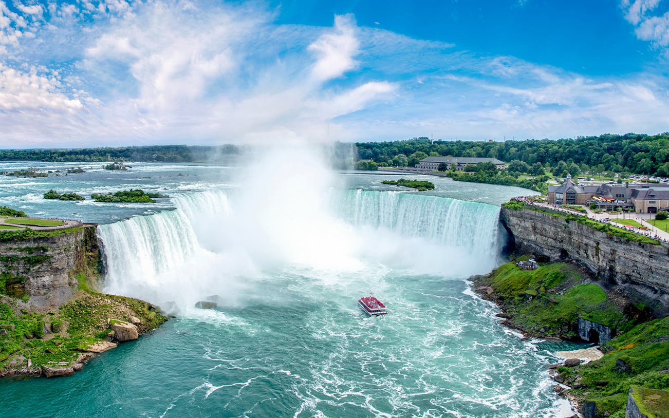 Boat approaching Niagara Falls on a scenic tour.