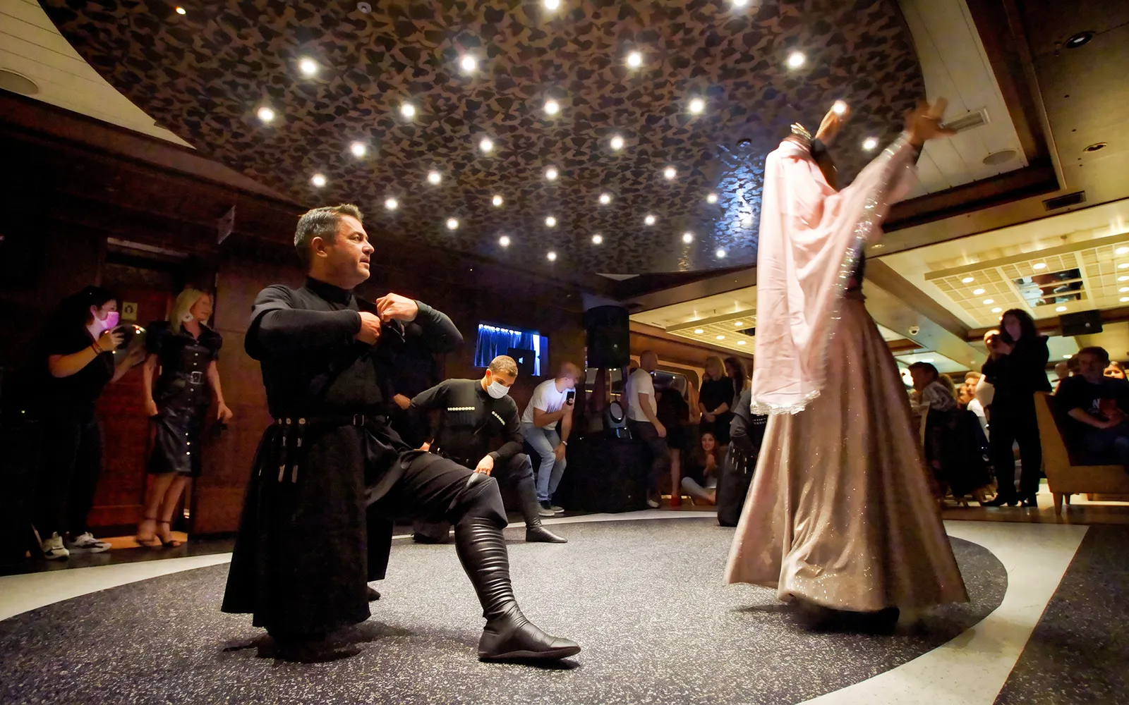 Traditional dancers performing on a Bosphorus dinner cruise in Istanbul.