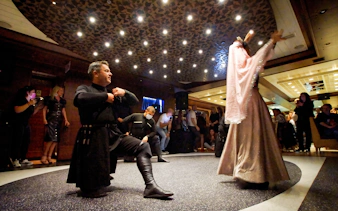 Traditional dancers performing on a Bosphorus dinner cruise in Istanbul.