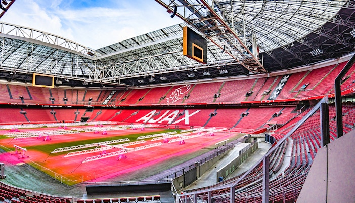 Visitors exploring the iconic Johan Cruijff ArenA during the Classic Tour in Amsterdam