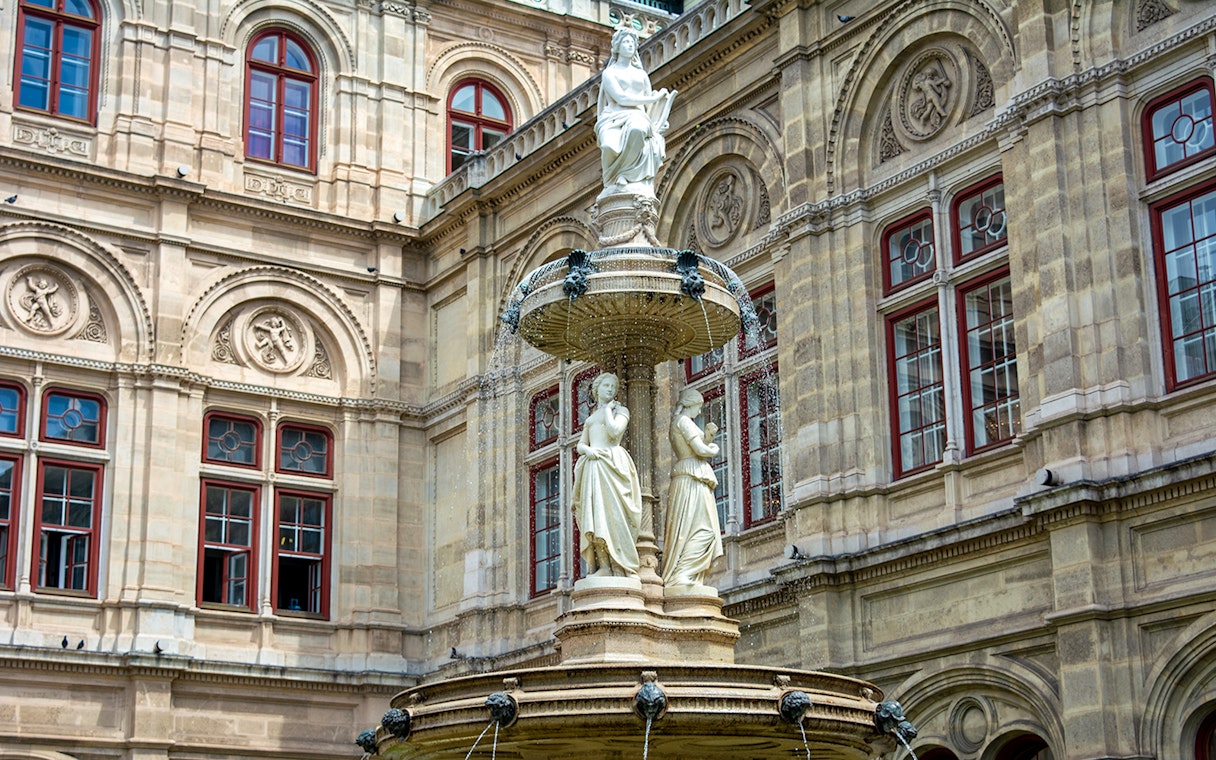 Statues on a fountain at the Vienna Opera House, Austria.