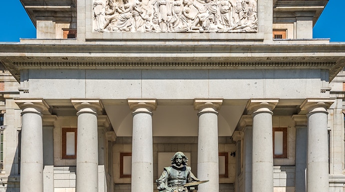 Statue of Velázquez at the entrance of the Prado Museum, Madrid, Spain.