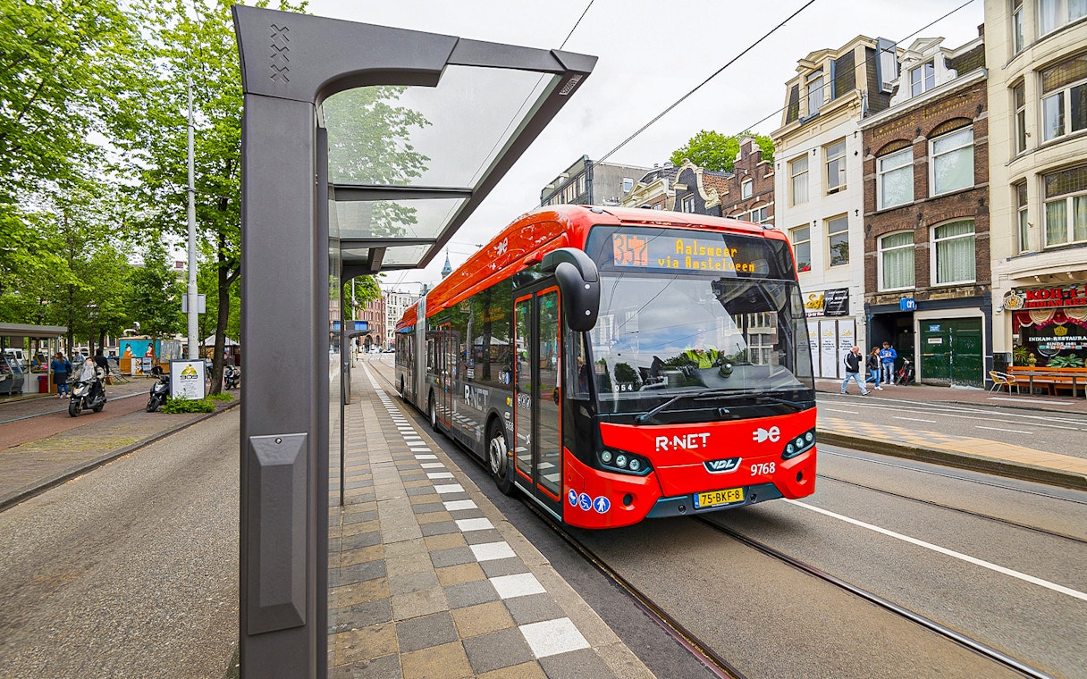 Amsterdam Airport Express bus at a city stop, heading to Elandsgracht.