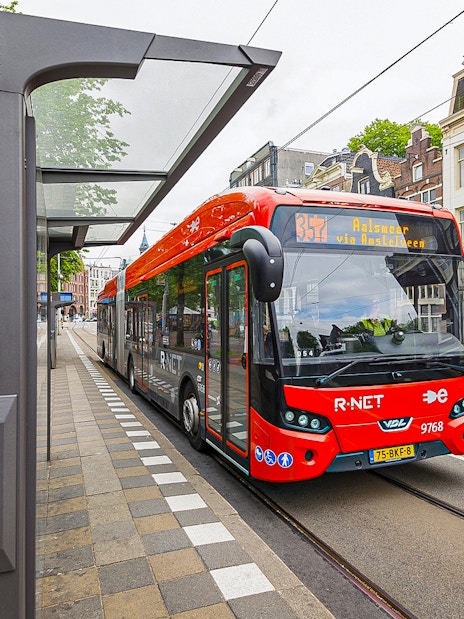 Amsterdam Airport Express bus at a city stop, heading to Elandsgracht.