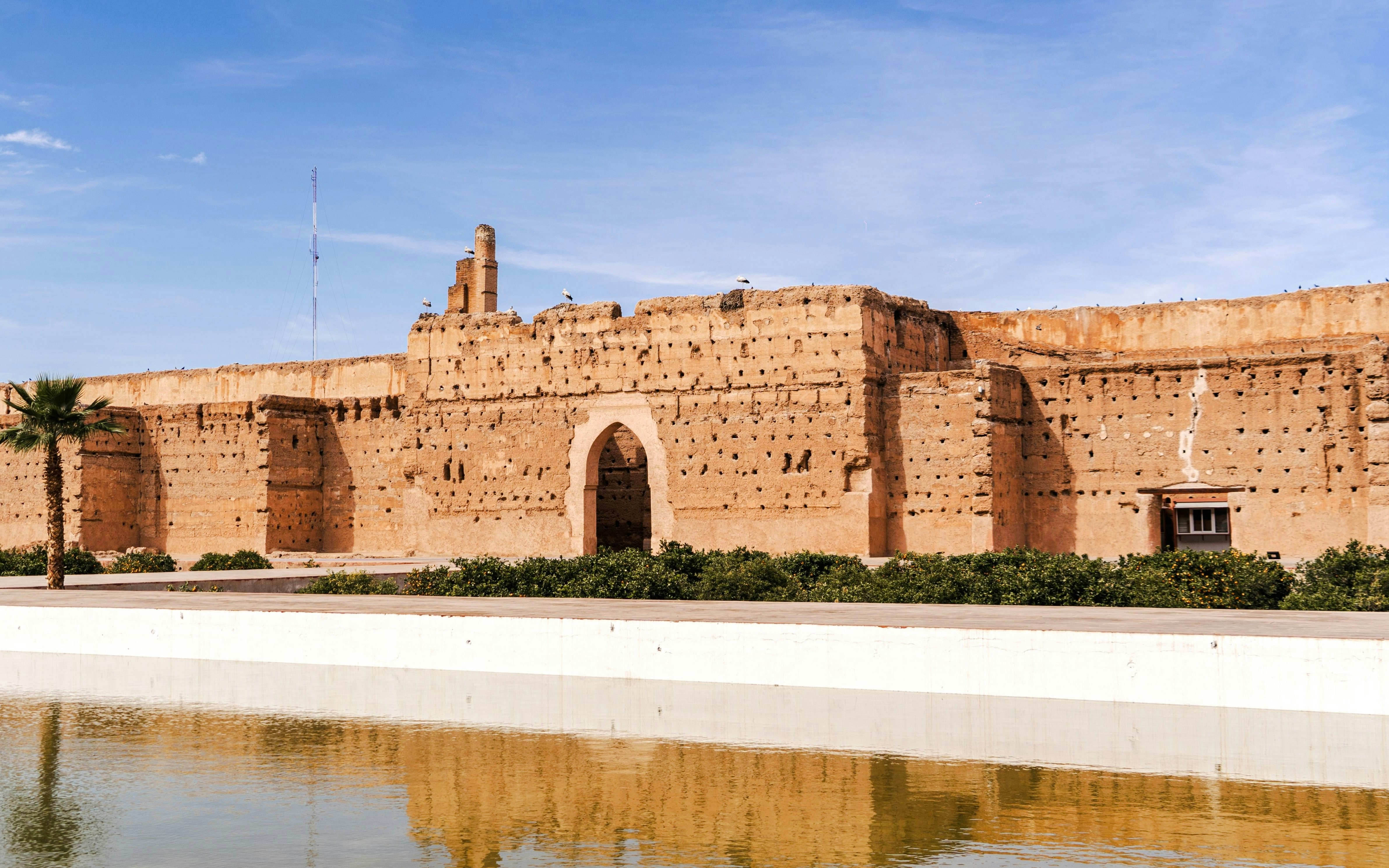 El Badi Palace ruins with reflection in water, Marrakech, Morocco.