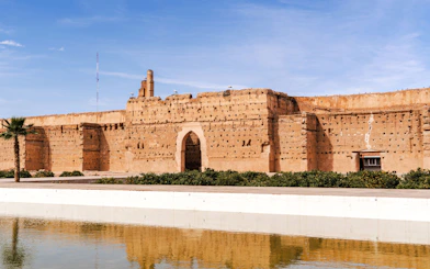 El Badi Palace ruins with reflection in water, Marrakech, Morocco.