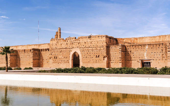 El Badi Palace ruins with reflection in water, Marrakech, Morocco.