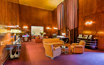 Radio City Music Hall lounge with art deco furniture and decor.