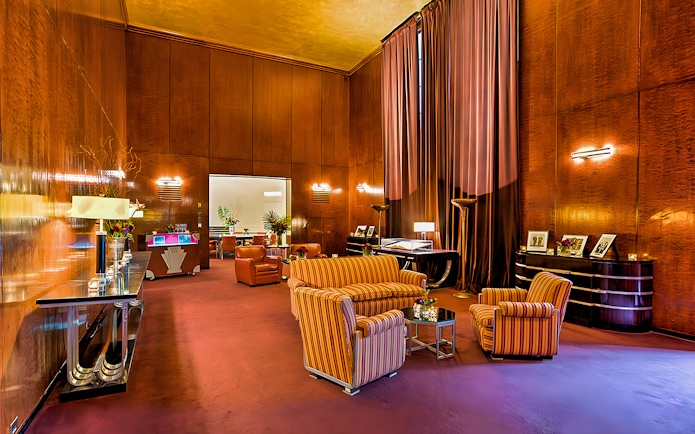 Radio City Music Hall lounge with art deco furniture and decor.