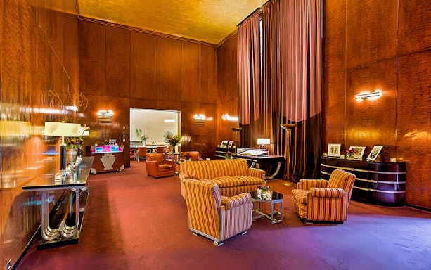 Radio City Music Hall lounge with art deco furniture and decor.