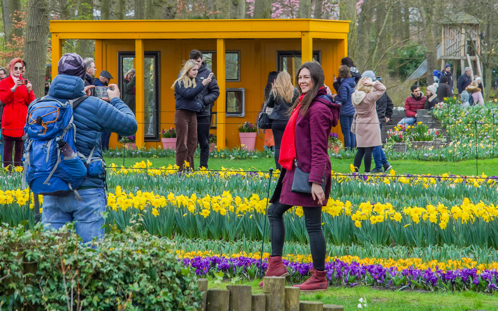 Guests photographing vibrant flowers at Keukenhof Gardens, Netherlands.