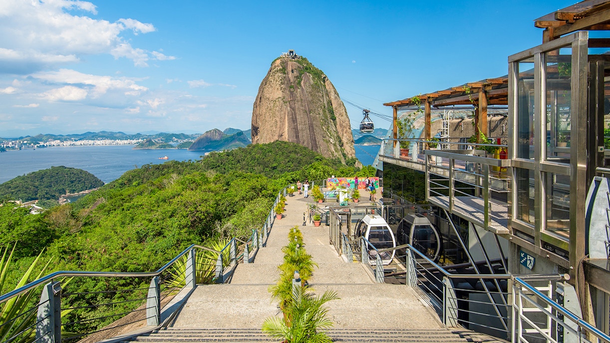 View of Sugarloaf Mountain from Urca Mountain with cable cars, Rio de Janeiro, Brazil.