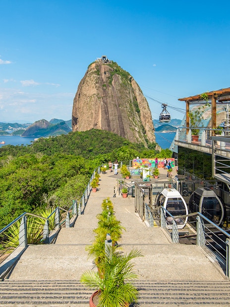 View of Sugarloaf Mountain from Urca Mountain with cable cars, Rio de Janeiro, Brazil.