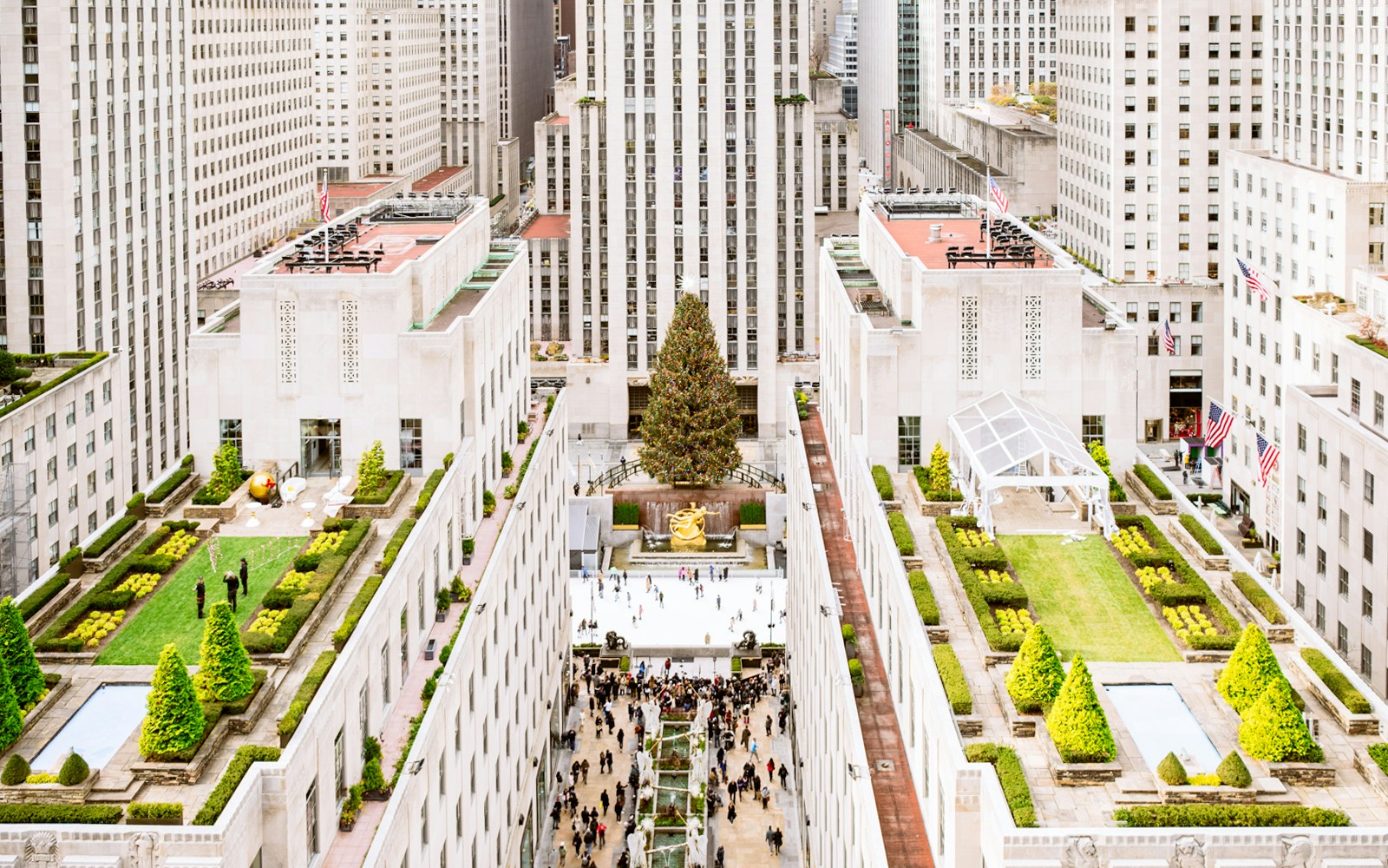 Rockefeller Center holiday lights with Top of the Rock view, New York City.