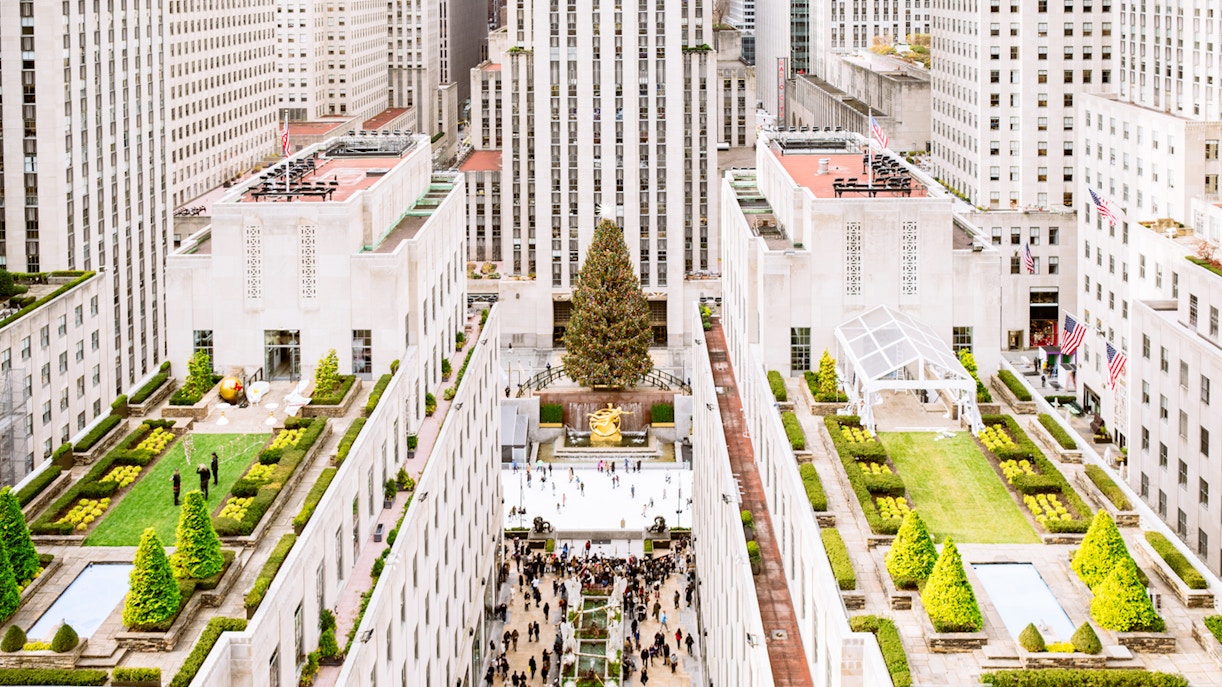 Rockefeller Center holiday lights with Top of the Rock view, New York City.