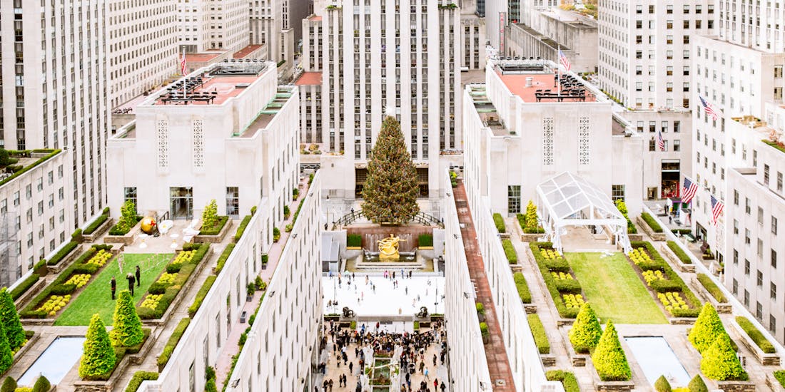Rockefeller Center holiday lights with Top of the Rock view, New York City.