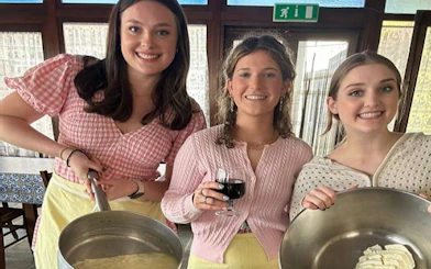 Cooking class participants making pasta and mozzarella at Amalfi Coast farmhouse.