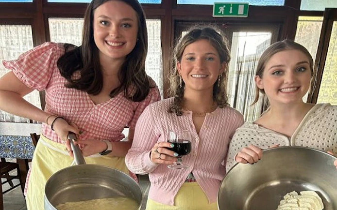 Cooking class participants making pasta and mozzarella at Amalfi Coast farmhouse.