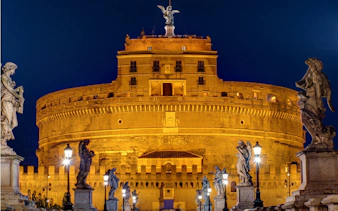 Castel Sant'Angelo illuminated at night, Rome, part of Ghosts of Rome exploration game.