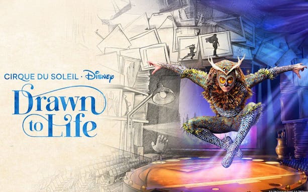 Performer in colorful costume leaping on stage for Drawn to Life by Cirque du Soleil & Disney.