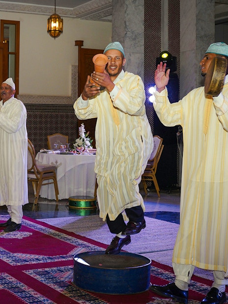 Dancers performing traditional music during Marrakech Night Walking Tour.