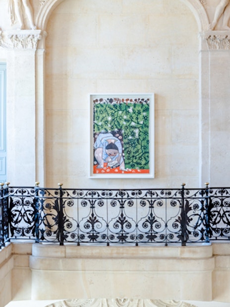 Artwork displayed in the Picasso Museum, Paris, featuring a colorful painting on a decorative wall.