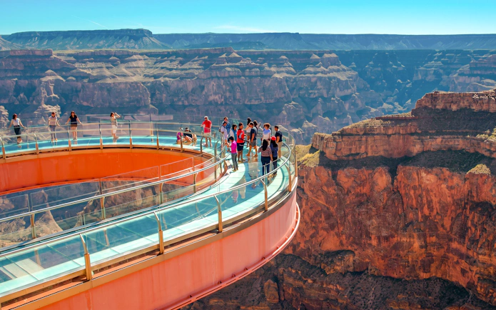 Visitors on the Grand Canyon Skywalk with canyon views in Arizona.