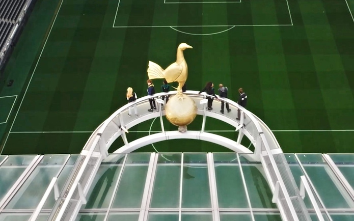 Visitors walking on the Dare Skywalk at Tottenham Hotspur Stadium.