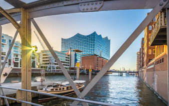 Elbphilharmonie Hamburg viewed from a bridge over the canal during Elphi Außenführung tour.