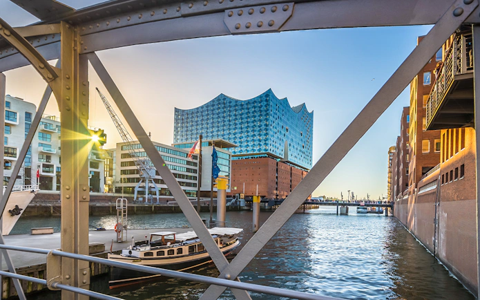 Elbphilharmonie Hamburg viewed from a bridge over the canal during Elphi Außenführung tour.