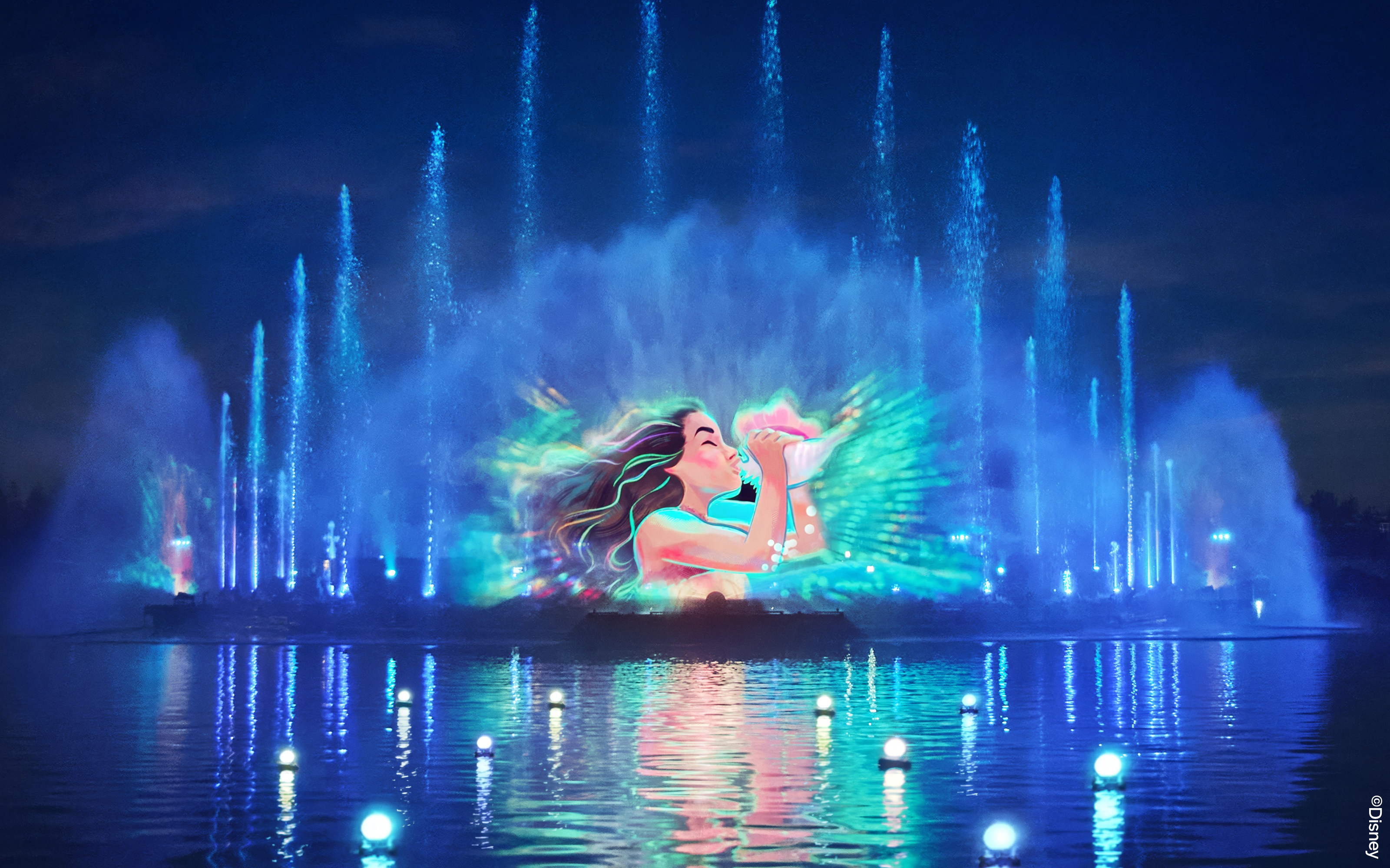 Disneyland World of Frozen Illuminations with vibrant water and light show.