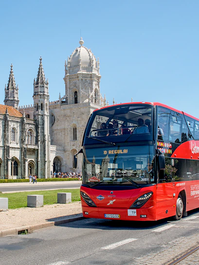 Hop-on hop-off bus in front of Jerónimos Monastery, Lisbon.