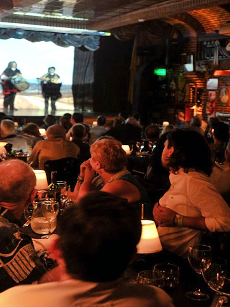 Audience enjoying live music at La Ventana Tango Show in Buenos Aires.