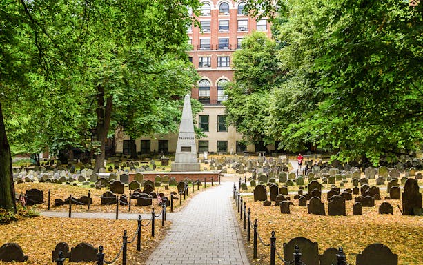 Granary Burying Ground in Boston with historic gravestones and Franklin monument.
