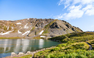 Alaska Railroad scenic view of a mountain and lake.