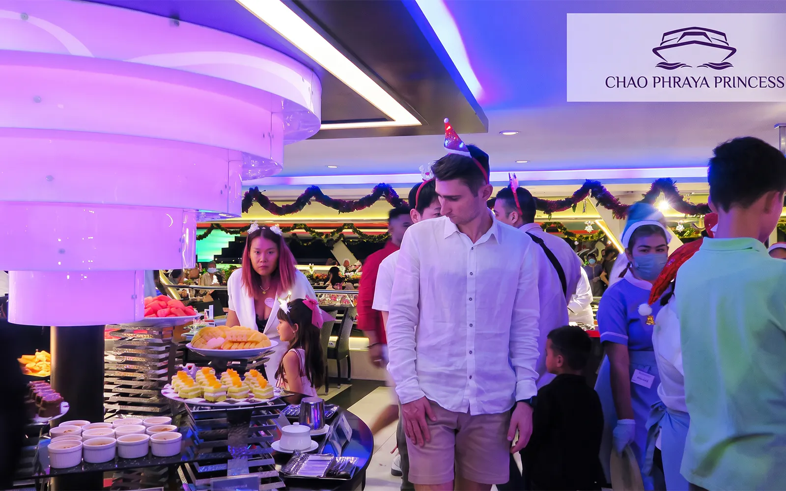 Guests enjoying buffet on Chao Phraya Princess New Year's Eve Dinner Cruise.