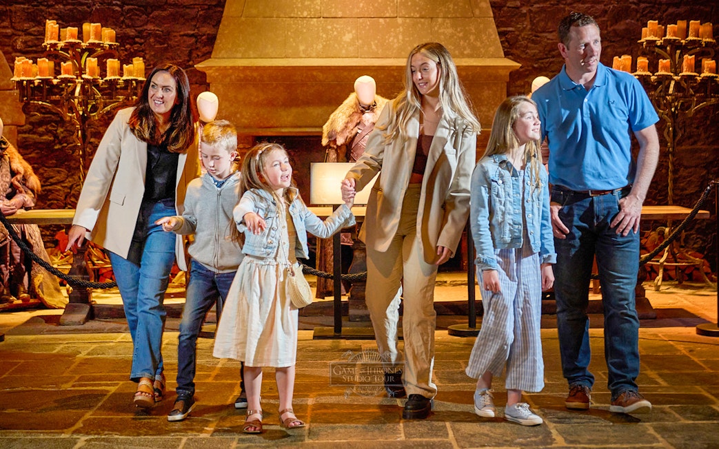 Tourists exploring Game of Thrones Studio Tour in Belfast.